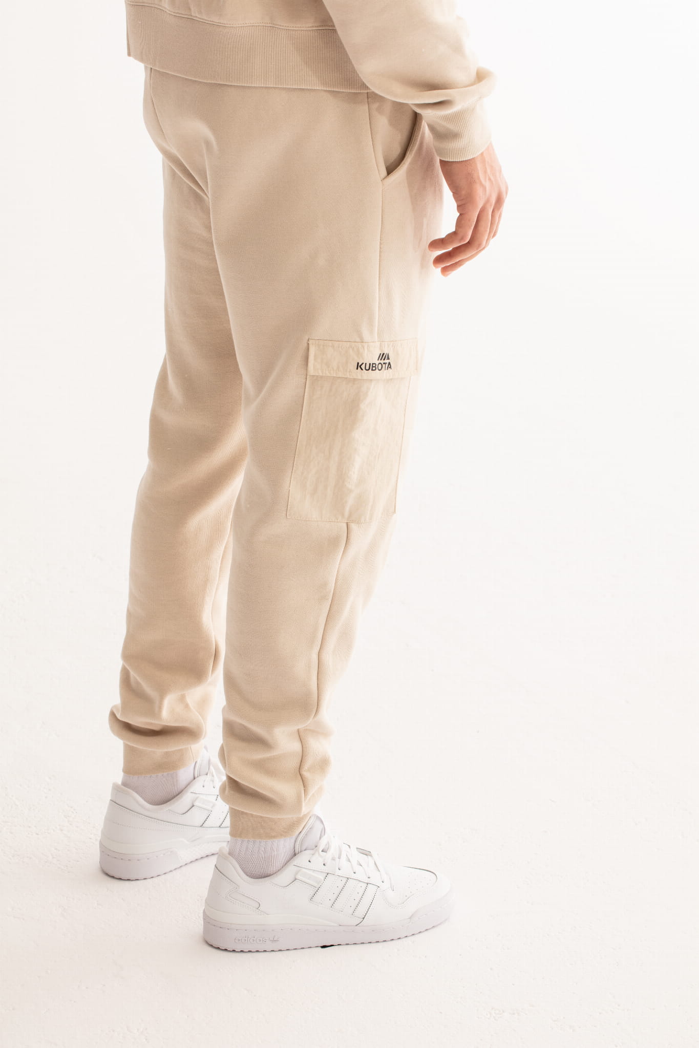 KUBOTA SPODNIE DRESOWE UNISEX BEŻOWE